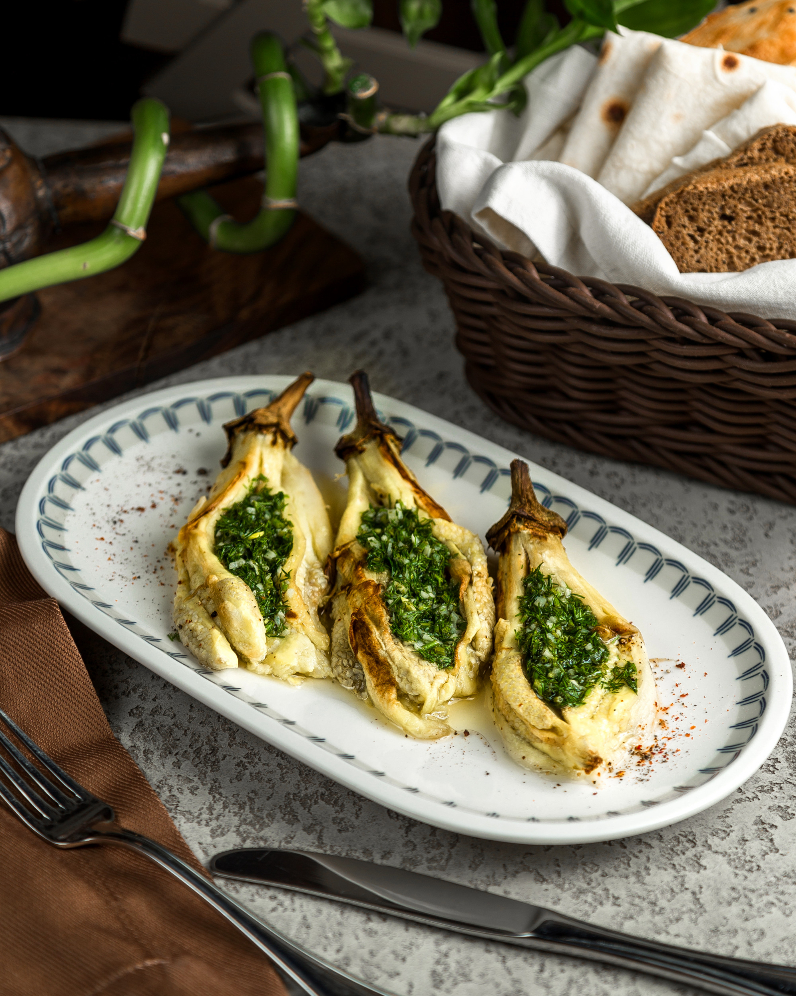 Charred greens with toasted seed dressing